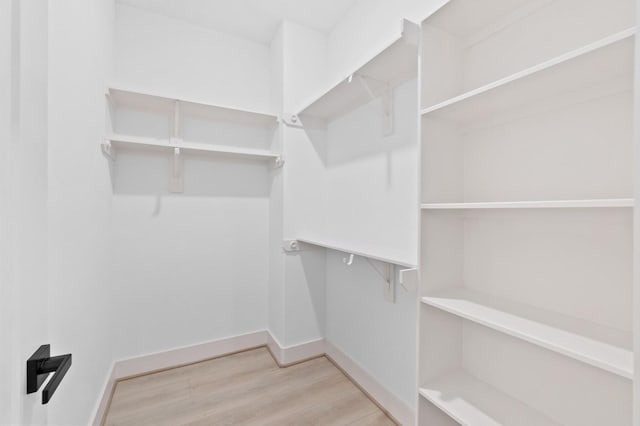 501 E 39th St, Houston, TX 77022 - walk in closet with light wood-style flooring