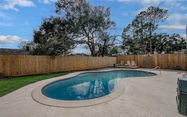 view of pool featuring a fenced in pool, a patio area, and a fenced backyard
