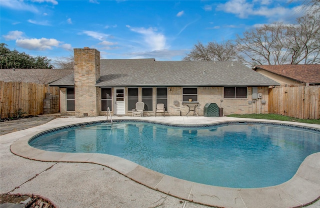 view of pool with a fenced in pool, a patio area, and a fenced backyard