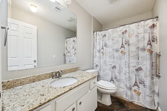 22403 Elsinore Dr, Katy, TX 77450 - full bathroom featuring vanity, a textured ceiling, and a shower with curtain