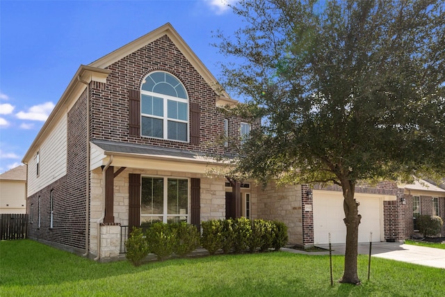 view of front of home with a garage and a front yard