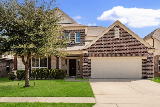 view of front of property with a front yard and a garage