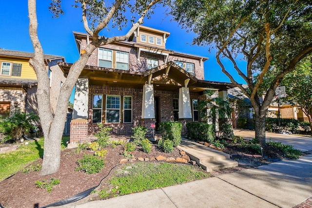 view of front of property featuring brick siding