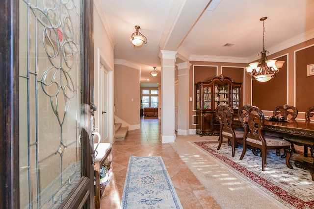 dining area featuring baseboards, decorative columns, light tile patterned flooring, ornamental molding, and stairs