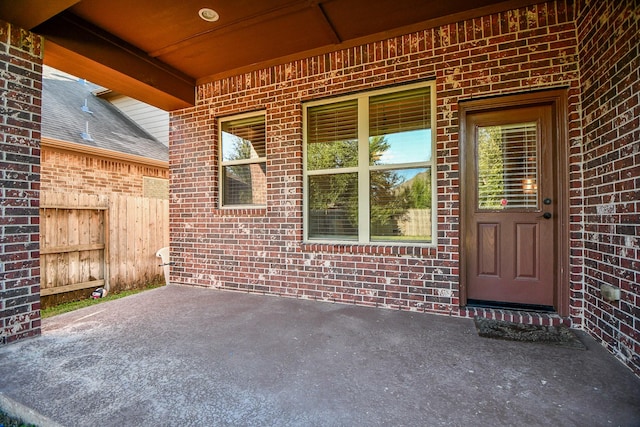 view of patio with fence