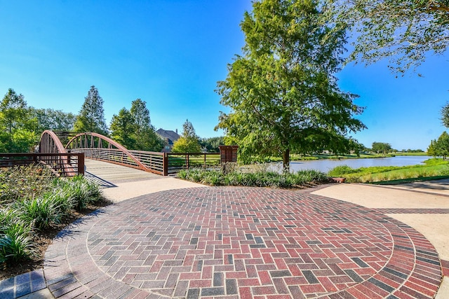 view of gate featuring a water view