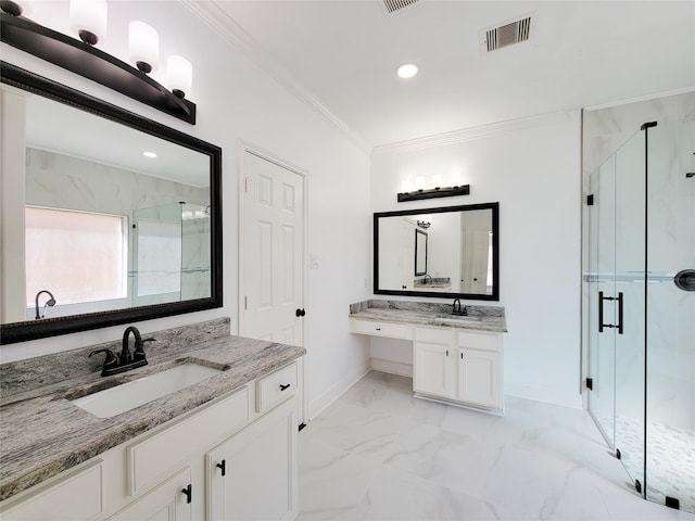 bathroom with ornamental molding, vanity, and a shower with shower door