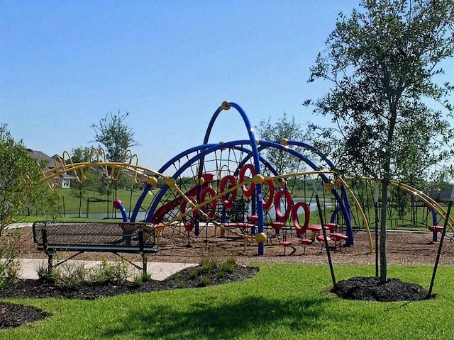 view of jungle gym featuring a yard