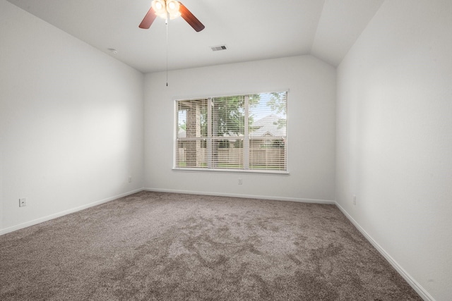 114 Kohen Ct, Montgomery, TX 77316 - empty room with carpet flooring, ceiling fan, baseboards, and vaulted ceiling