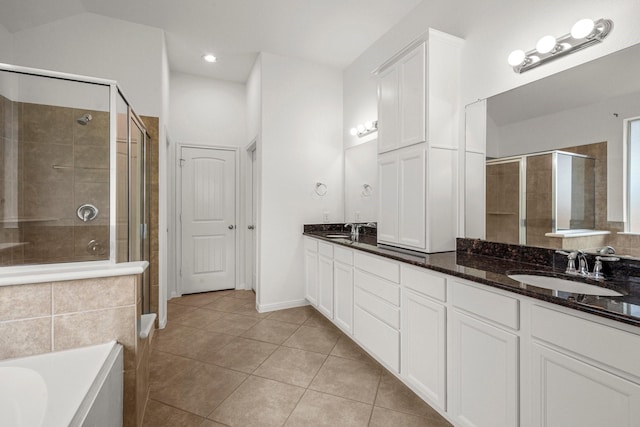 114 Kohen Ct, Montgomery, TX 77316 - bathroom featuring double vanity, a stall shower, tile patterned floors, a garden tub, and recessed lighting
