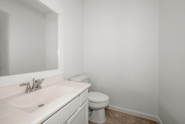 114 Kohen Ct, Montgomery, TX 77316 - bathroom with vanity, toilet, tile patterned flooring, and baseboards