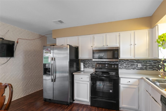 kitchen with white cabinetry, visible vents, light countertops, and appliances with stainless steel finishes