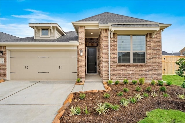 view of front of home with a garage