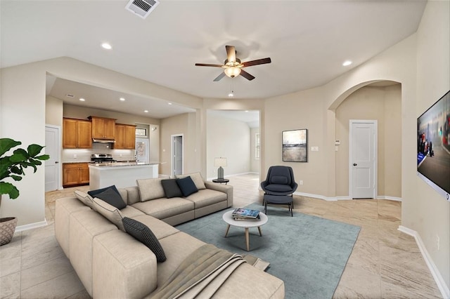 living room featuring ceiling fan