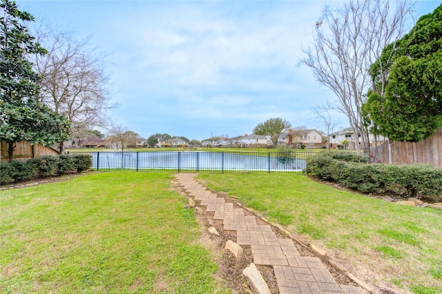 view of yard with a water view