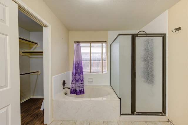 bathroom with independent shower and bath