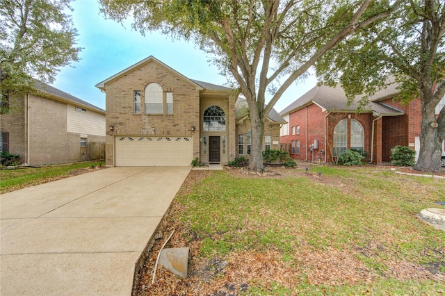 view of front property with a garage and a front lawn