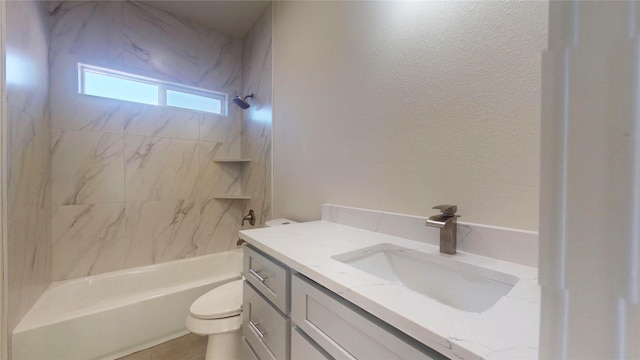 bathroom with toilet, tub / shower combination, and vanity