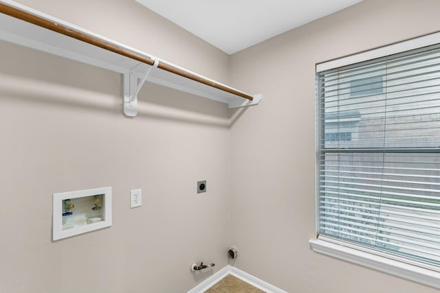 washroom featuring laundry area, hookup for an electric dryer, hookup for a washing machine, and hookup for a gas dryer