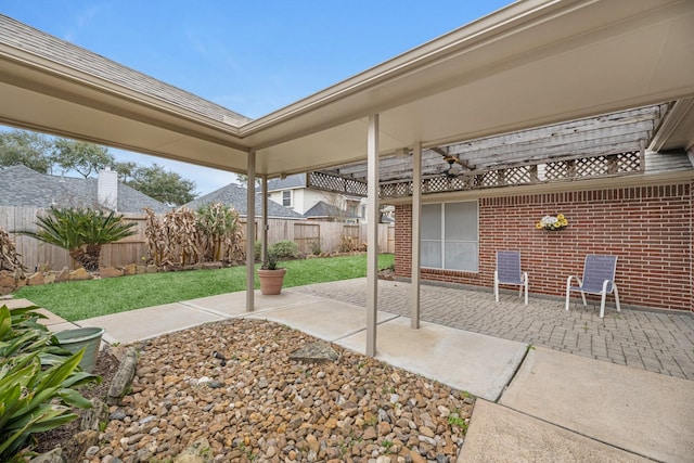 view of patio / terrace featuring a fenced backyard and a pergola