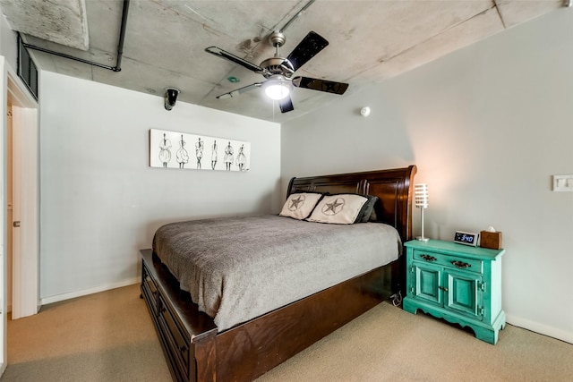 bedroom with baseboards and a ceiling fan