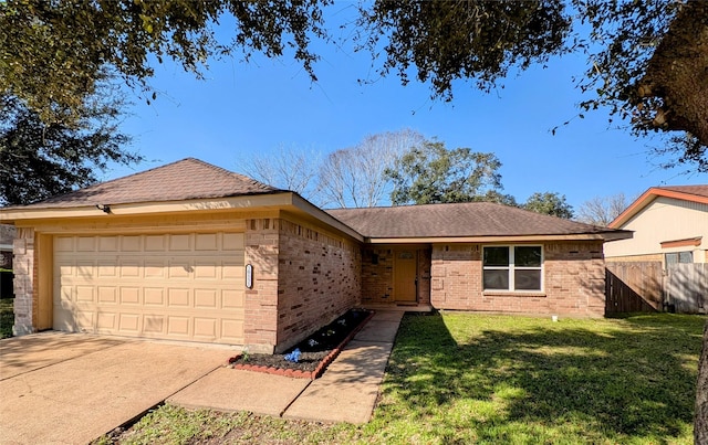 single story home featuring a garage and a front yard