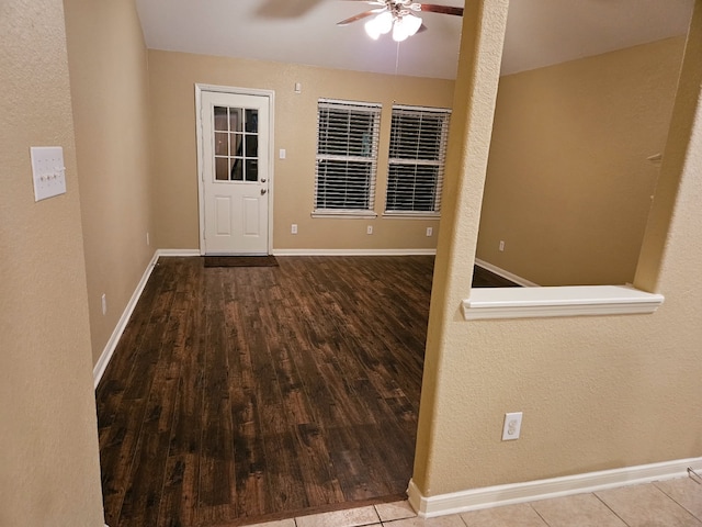 foyer with ceiling fan and hardwood / wood-style floors