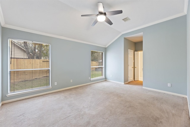 unfurnished room with visible vents, ornamental molding, light carpet, vaulted ceiling, and baseboards