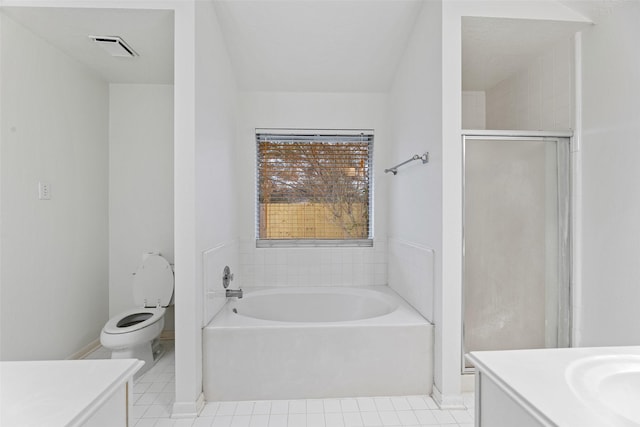 full bath with toilet, tile patterned floors, a garden tub, and vanity