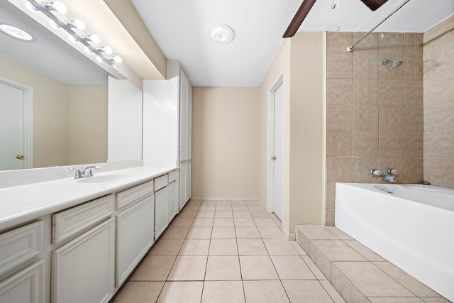 full bath with a tub to relax in, vanity, tiled shower, baseboards, and tile patterned floors