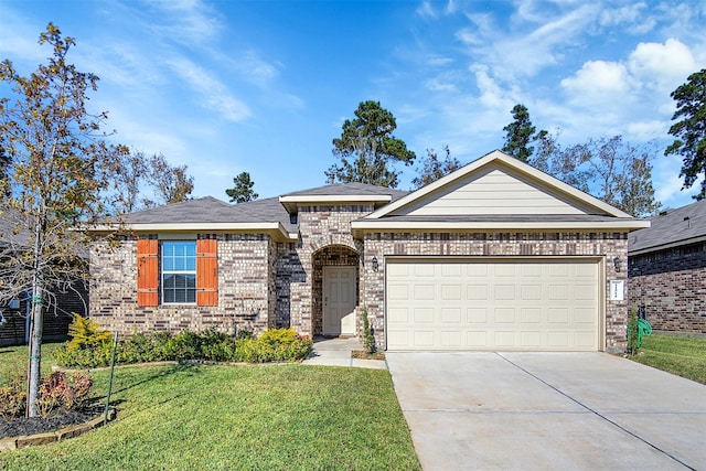 view of front of property featuring a garage, a front lawn, concrete driveway, and brick siding