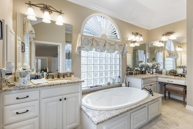 bathroom with a healthy amount of sunlight, ornamental molding, tile patterned flooring, and vanity