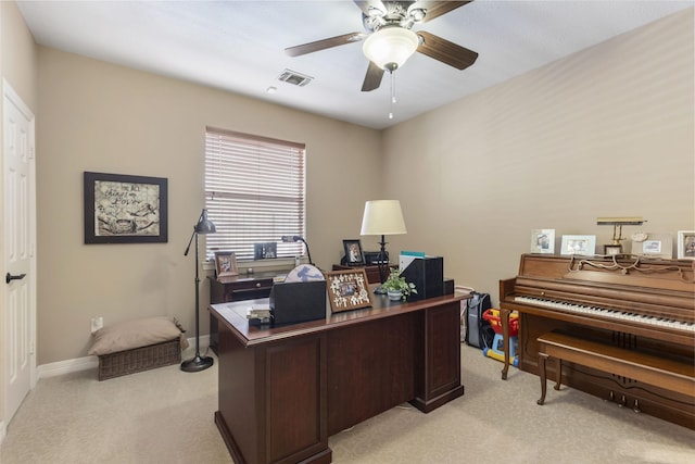 home office with ceiling fan and light colored carpet