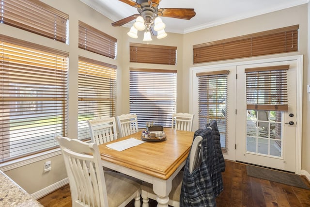 dining space with ceiling fan, ornamental molding, and dark hardwood / wood-style floors