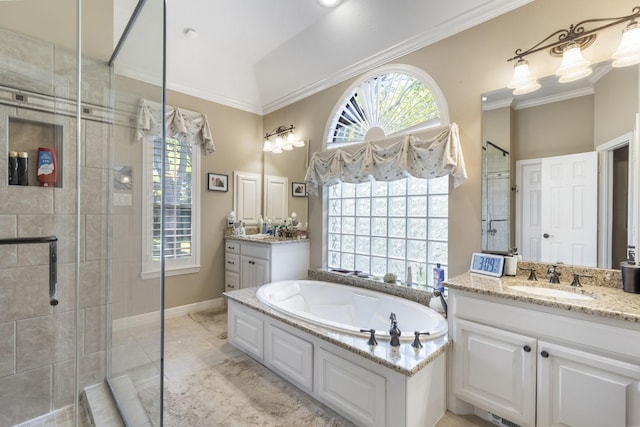 bathroom featuring crown molding, separate shower and tub, a wealth of natural light, and vanity