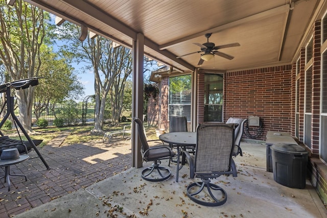 view of patio featuring ceiling fan