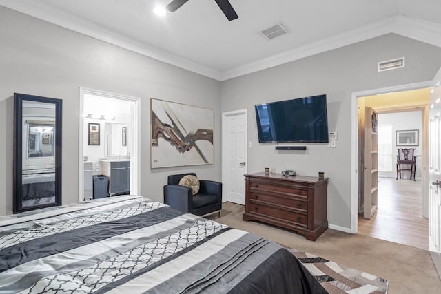 carpeted bedroom with ceiling fan and crown molding