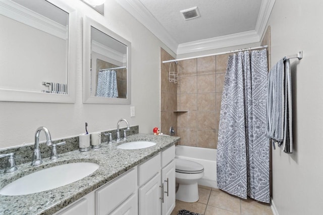 full bathroom with a textured ceiling, ornamental molding, vanity, and tile patterned flooring