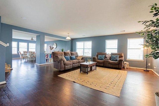 living room with dark wood-type flooring