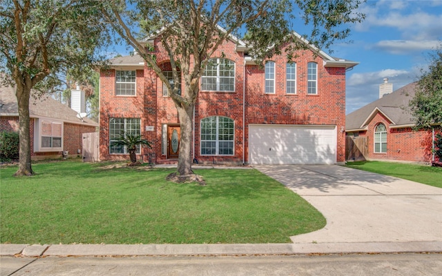 front facade with a garage and a front lawn