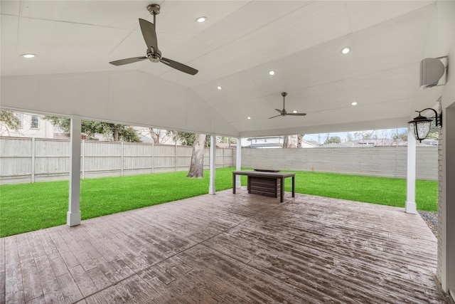 view of patio / terrace with ceiling fan and a deck