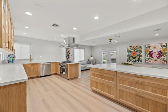 kitchen featuring french doors, light hardwood / wood-style flooring, kitchen peninsula, stainless steel appliances, and range hood