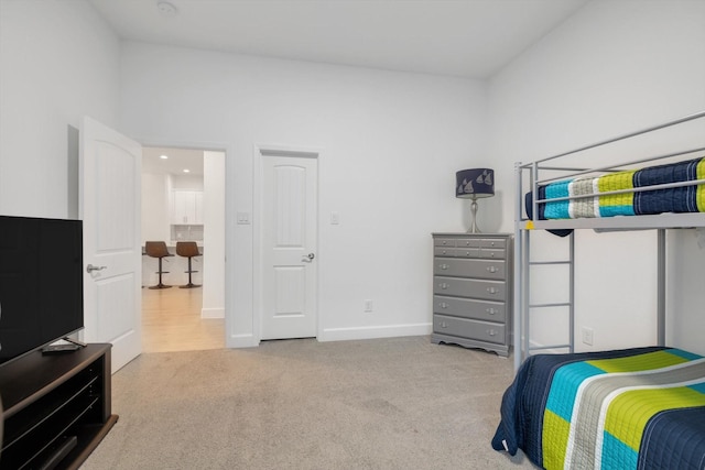 bedroom with light carpet