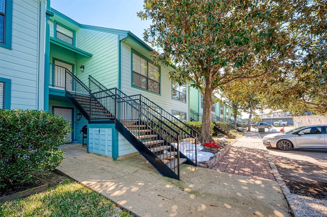 view of home's exterior featuring stairway