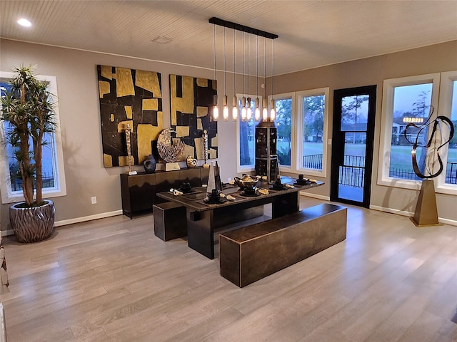 interior space with light wood-type flooring and baseboards