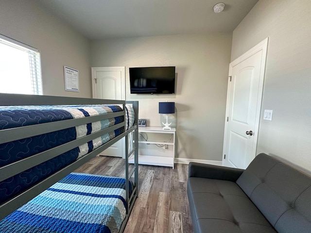 bedroom featuring hardwood / wood-style flooring