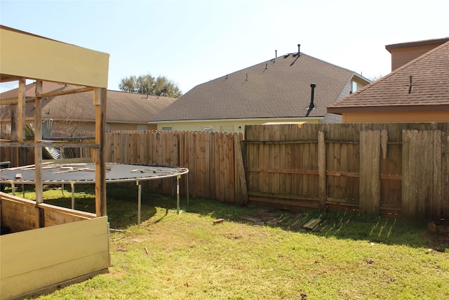 view of yard featuring a trampoline