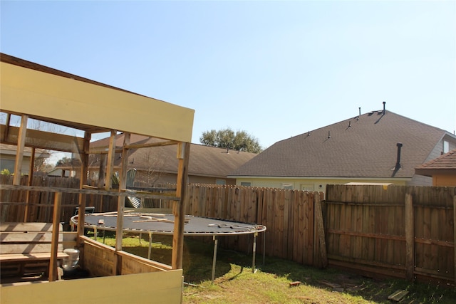 view of yard featuring a trampoline