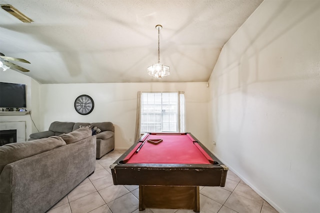 rec room featuring vaulted ceiling, light tile patterned floors, ceiling fan, and pool table