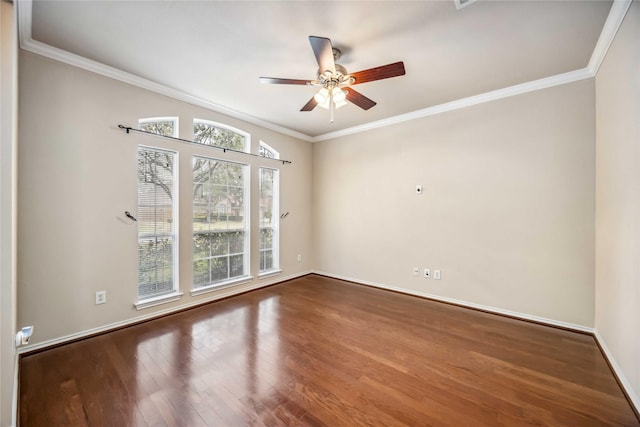 empty room with hardwood / wood-style flooring, ceiling fan, and crown molding